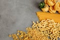 Ingredients for Italian Pasta on concrete background. Flat lay with copy space for text. Royalty Free Stock Photo