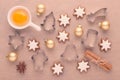 Ingredients with kitchen tools for dessert baking and star cookies on baking paper