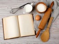 Ingredients and kitchen tools with the old blank recipe book Royalty Free Stock Photo