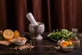 Ingredients for making basil sauce pesto at home using a mortar and pestle Royalty Free Stock Photo