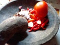 Make chili sauce with a mortar and pestle Royalty Free Stock Photo