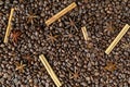 Ingredients for making coffee - Background of roasted coffee beans with star anise and cinnamon Royalty Free Stock Photo