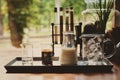 Ingredients for making cold coffee latte, ice cubes espresso milk and sweet syrup served in various test tubes on wooden table Royalty Free Stock Photo