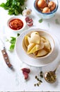 Ingredients for making conchiglie pasta with spicy red pesto