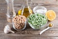 Ingredients for making green hummus. Chickpea and green pea hummus