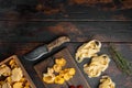 Ingredients for making italian pasta with mushrooms chanterelles, on old dark  wooden table background, top view flat lay, with Royalty Free Stock Photo