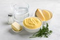 Ingredients for making Italian polenta with cheese: corn grits, two types of cheese, butter, salt and water. Cooking delicious