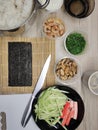 Ingredients for making Japanese sushi rolls on the table Royalty Free Stock Photo