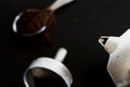 Ingredients for making moka coffee. Moka pot with coffee on dark background. Coffee making concept Royalty Free Stock Photo