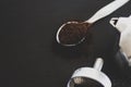 Ingredients for making moka coffee. Moka pot with coffee on dark background. Coffee making concept Royalty Free Stock Photo