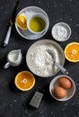 Ingredients for making orange cake with olive oil - flour, eggs, olive oil, powdered sugar Royalty Free Stock Photo