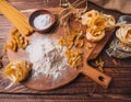 Ingredients for making pasta, flour, on a vintage wooden cutting board Royalty Free Stock Photo