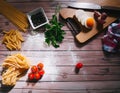 Ingredients for making pasta, flour, on a vintage wooden cutting board Royalty Free Stock Photo