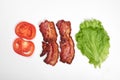 Ingredients for making sandwich. fresh vegetables, tomatoes, bread, becon, cheese. Isolated on white background, top