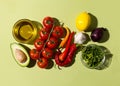 The ingredients for making Spicy Guacamole are avocado, red onion, tomato, chili, lime, cilantro, and garlic. National Royalty Free Stock Photo