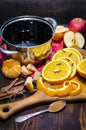 Ingredients for mulled wine. Oranges, wine and spices for making a hot drink