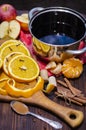 Ingredients for mulled wine. Oranges, wine and spices for making a hot drink