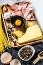 Ingredients for Pasta Carbonara. Traditional Italian food. Gray background. Top view Royalty Free Stock Photo