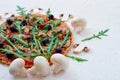 Ingredients for pizza - fresh mushrooms on the white table with free copy space on the right side. Vegetarian pizza Royalty Free Stock Photo