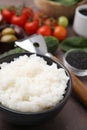 Ingredients for poke bowl on grey table, closeup