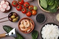 Ingredients for poke bowl on grey table, flat lay