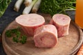 Ingredients for preparing beef bone broth or soup - fresh marrow bones and vegetables Royalty Free Stock Photo
