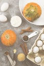 Ingredients for pumpkin pie - flour, pumpkins, eggs, cane sugar, various spices (nutmeg, ginger, cinnamon, anise) and white round Royalty Free Stock Photo