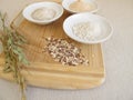 Ingredients for rye bread with rye flour, groats, sourdough and seed mixture