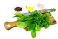 Ingredients for salad from green leaves of garden herbs on cutting board Royalty Free Stock Photo