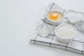 Ingredients set for baking, serving on towel. Cooking pie, cake, pancakes. Flour, eggs, sugar, for sweet pastries on Royalty Free Stock Photo