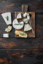Ingredients for spanish food, meat cheede, herbs, on dark wooden background, flat lay  with copy space for text Royalty Free Stock Photo