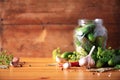 Ingredients, spices and herbs for canning cucumbers over wooden background. Copy space. Dill flowers, bay leaf Royalty Free Stock Photo