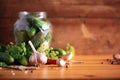 Ingredients, spices and herbs for canning cucumbers over wooden background. Copy space. Dill flowers, bay leaf Royalty Free Stock Photo