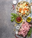 Ingredients for the stew with turkey and vegetables border ,place for text wooden rustic background top view close up Royalty Free Stock Photo