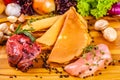 Ingredients for stuffed pancakes with meat and mushrooms on wooden background Royalty Free Stock Photo