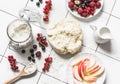 Ingredients for summer berry pie - dough, fresh ripe currant berries, raspberries, strawberries on a light background, top view Royalty Free Stock Photo