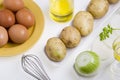 Ingredients for the preparation of a potato omelette.,