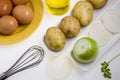 Ingredients for the preparation of a potato omelette.,