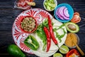 Ingredients for tacos : various fresh organic vegetables and tortillas on rustic background, top view, Mexican cuisine