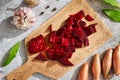 Sliced beetroot with garlic, onion and spices - ingredients to prepare fermented kvass Royalty Free Stock Photo