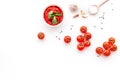 Ingredients for tomato sauce. Cherry tomatoes, garlic, green basil, black pepper, salt in spoon on white background top Royalty Free Stock Photo