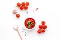 Ingredients for tomato sauce. Cherry tomatoes, garlic, green basil, black pepper, salt in spoon on white background top Royalty Free Stock Photo