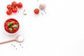 Ingredients for tomato sauce. Cherry tomatoes, garlic, green basil, black pepper, salt in spoon on white background top Royalty Free Stock Photo