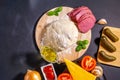 Ingredients for traditional Italian pizza on a dark background. Top view. Pizza recipe and menu. Space for text. Flat lay Royalty Free Stock Photo