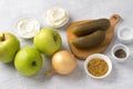 Ingredients for a traditional Polish salad: apples, pickles, onions, mayonnaise, sour cream or yogurt, mustard, salt