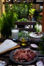 Ingredients for traditional spanish croquettes on wooden table