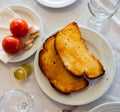 Ingredients for traditional Spanish Pa amb tomaquet on table