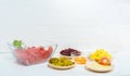 Ingredients for a traditional Swedish dish beef Lindstrom. Freshly minced beef, boiled potato, white chopped onion, pickles, pickl Royalty Free Stock Photo