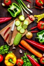 Ingredients for vegetable ragout on wooden background top view