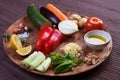 Ingredients vegetables for soup with pesto sauce and basil on a wooden plate. Soup boul Royalty Free Stock Photo